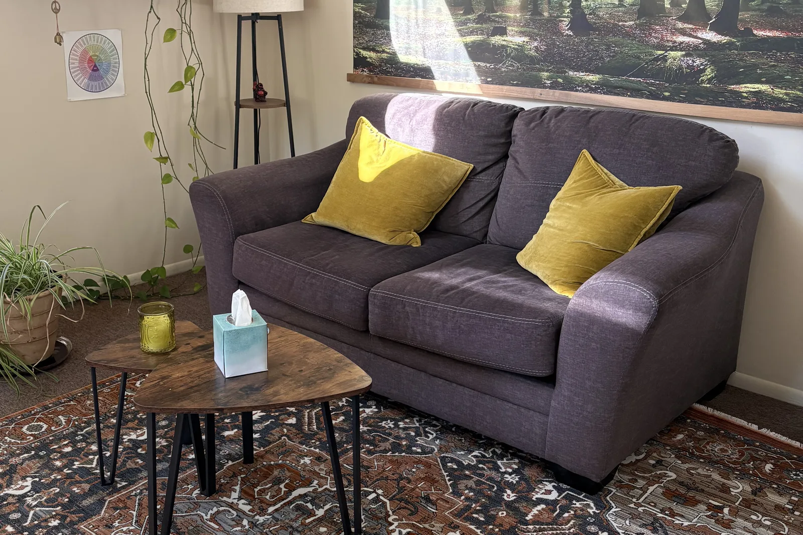 Couples therapy, in Walnut Creek, CA with a two-seat couch and warm afternoon light